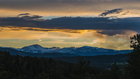 timelapse sunset denver nuggets broncos rockies mount evans spring rocky mountain stunning landscape clouds orange yellow golds stunning beautiful evergreen conifer pine tree forest mountain layers