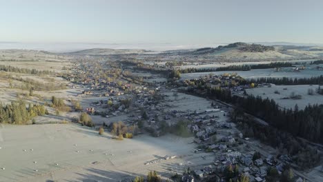 Aerial-at-dawn-of-rural-village-Witow-in-Southern-Poland,-scenic-landscape