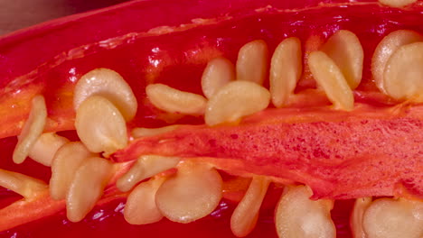 close up extreme of red pepper and seeds