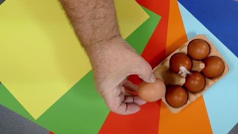 Chicken-eggs-in-tray-on-coloured-backgrounds