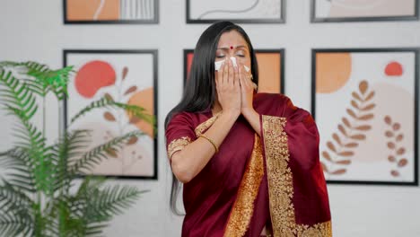 indian woman sneezing