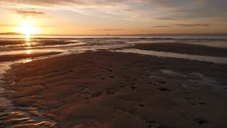 sunrise in leven fife scotland with sand river abd sea