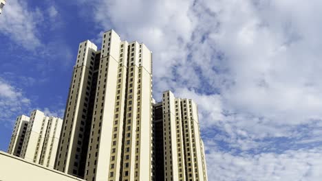 tall residential buildings under a blue sky