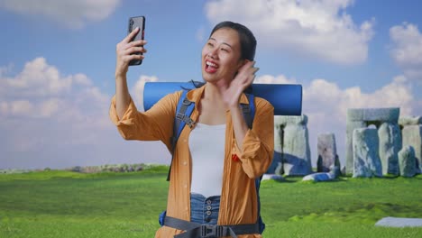 woman taking selfie at stonehenge