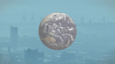 animation of earth floating above cityscape with cranes and buildings in background