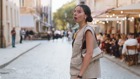 confused woman worrying to be punctual with anxiety checking time on watch running late to work