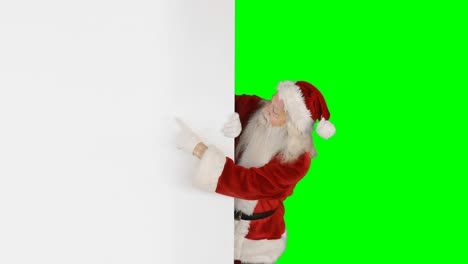 Santa-Claus-Escondido-Detrás-De-La-Pantalla-Verde