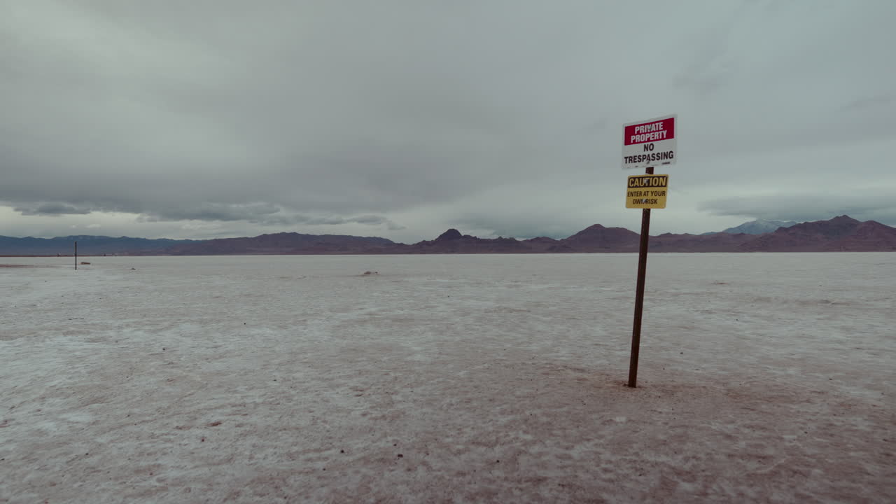 Empty Salt Flat with No Trespassing Sign