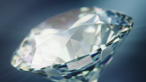 close up of a rotating cut diamond against a blue background