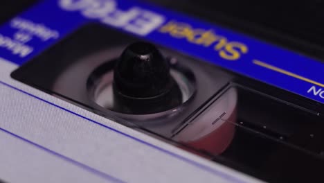 inserting and start playing audio cassette tape recording, macro close up