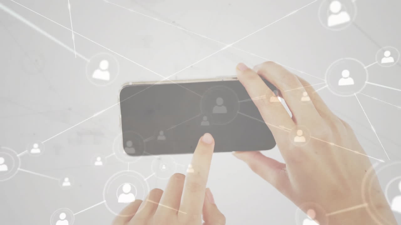 Designer hands holding smartphone, showing touchscreen social network overlay for technology