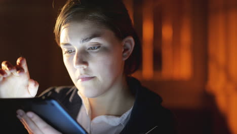 woman-using-tablet-computer-touchscreen-close-up