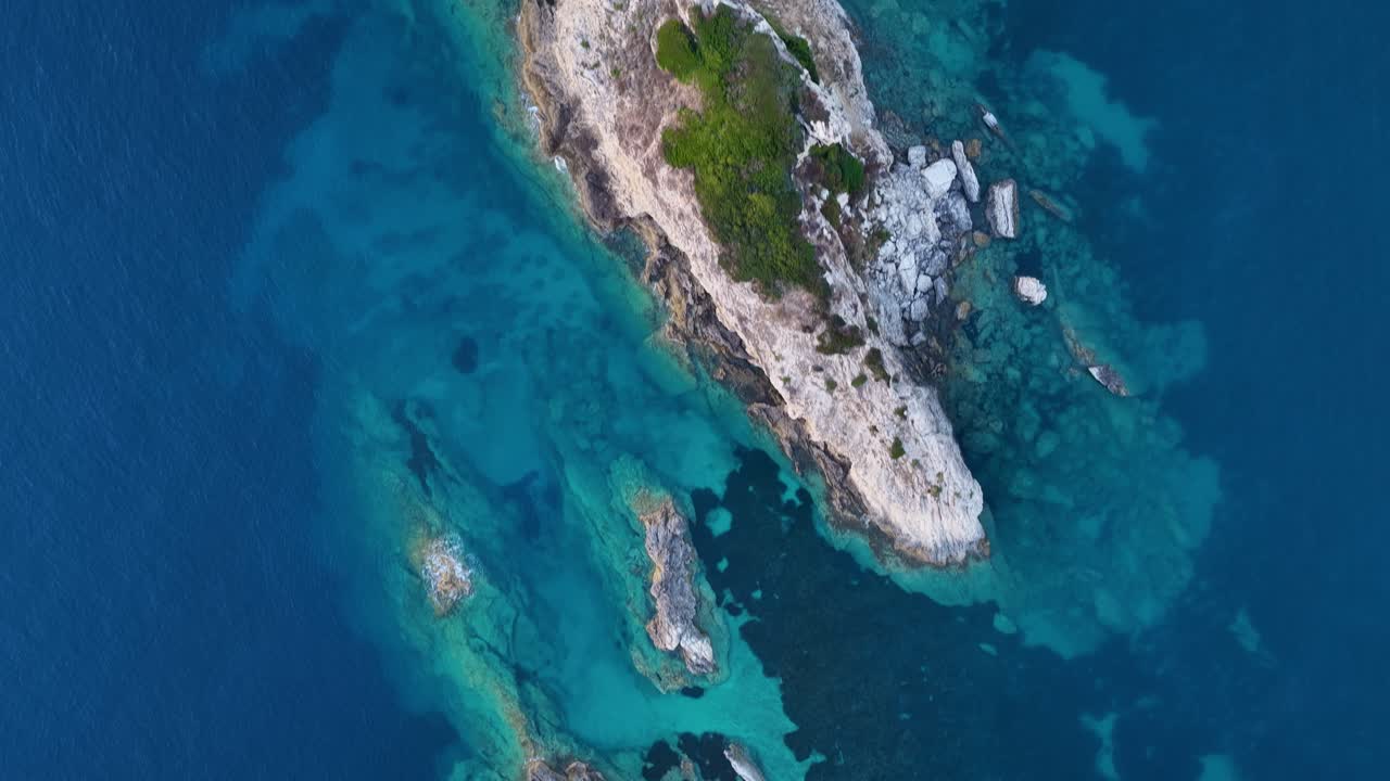 Aerial P Rugged Cliffs, Lush Greenery, and Deep Turquoise Waters – Unspoiled Nature from Above,