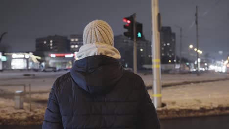 Person-crossing-street-on-flashing-green-light,-make-it-on-time-concept