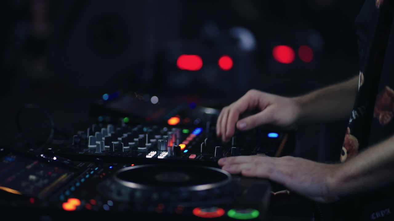 DJ Mixing Music at a Nightclub