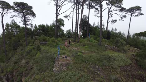 Man-Walks-along-the-Mountains-to-the-Top