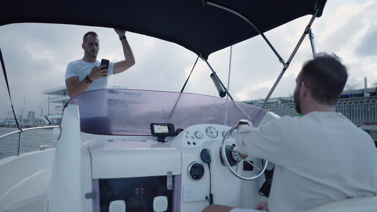 Friends enjoying a boat ride and capturing memories