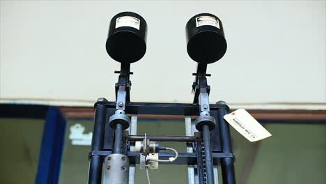 Double standard auto compactor with rotating base compacts two Marshall asphalt specimens simultaneously in indexing molds