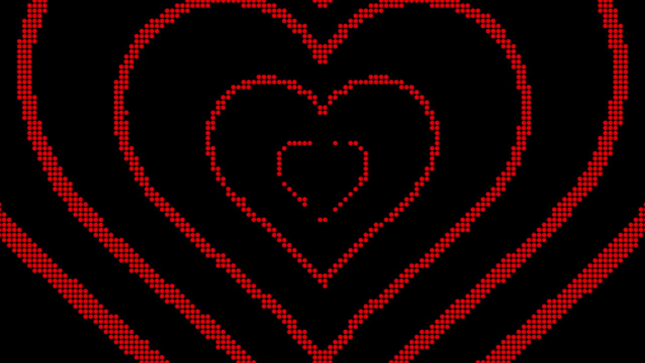 Red heart shape dot pixel, seamless loop on black background animation