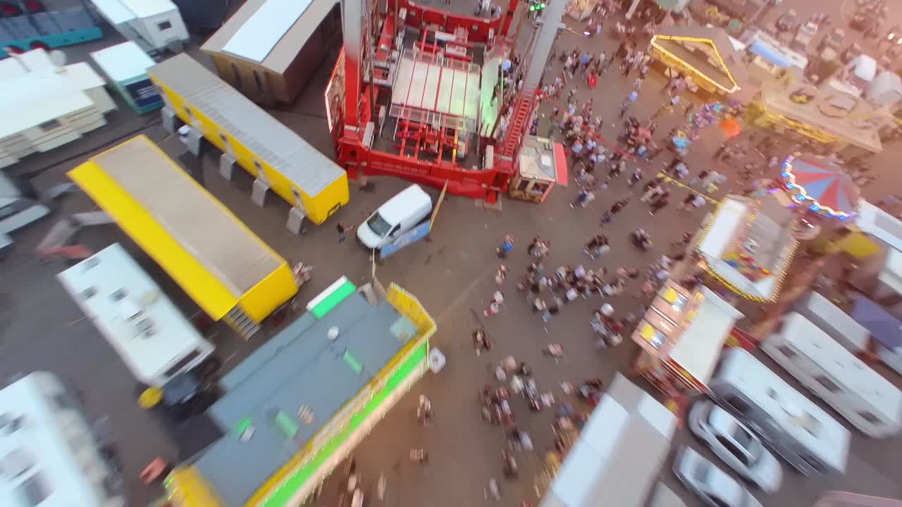 Enjoying Pendulum Fun Ride at Funfair, POV