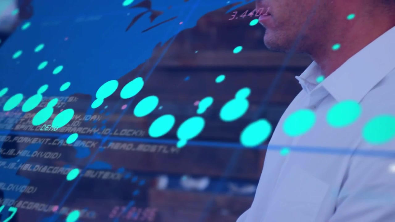 Data analyst typing on keys and analyzing data, causing overlays of numbers and map over profile