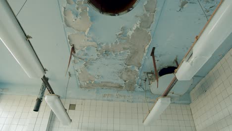 Abandoned-demolished-soviet-heritage-building-interior-ceiling-stairs-floor