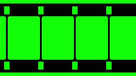 16mm film strip moveing on green background. seamless loopable video footage on green screen. abstract film strip design template.