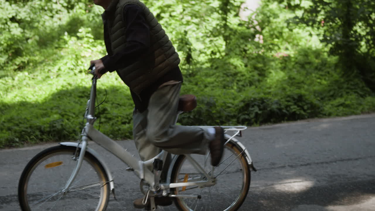 Person with a Bicycle on the Road