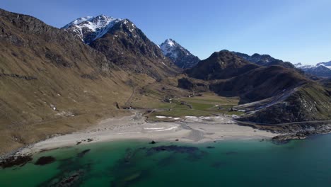 aerial forwarding shot of haukland beach during late winter in april
