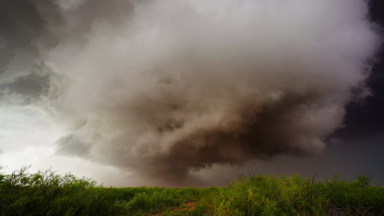 Dangerous Tornado Churning Under Dramatic Rotating Supercell