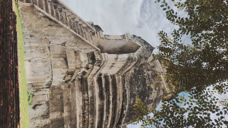 vertical of thai buddhist pagoda in deep jungle forest