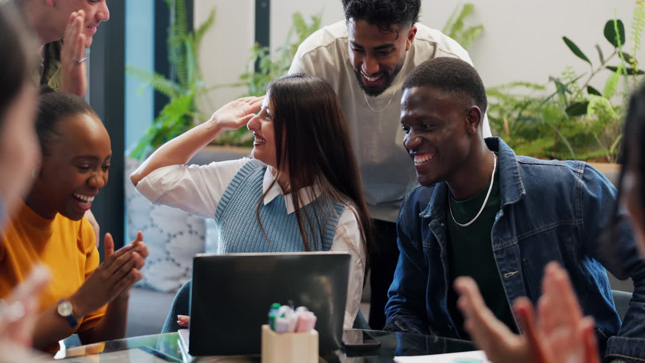 Multi-Ethnic Business Team Celebrating Success with High Fives