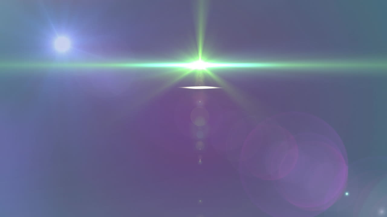 파란색 배경 위에 있는 빛의 반점들의 애니메이션