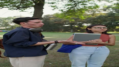 students talking in a park