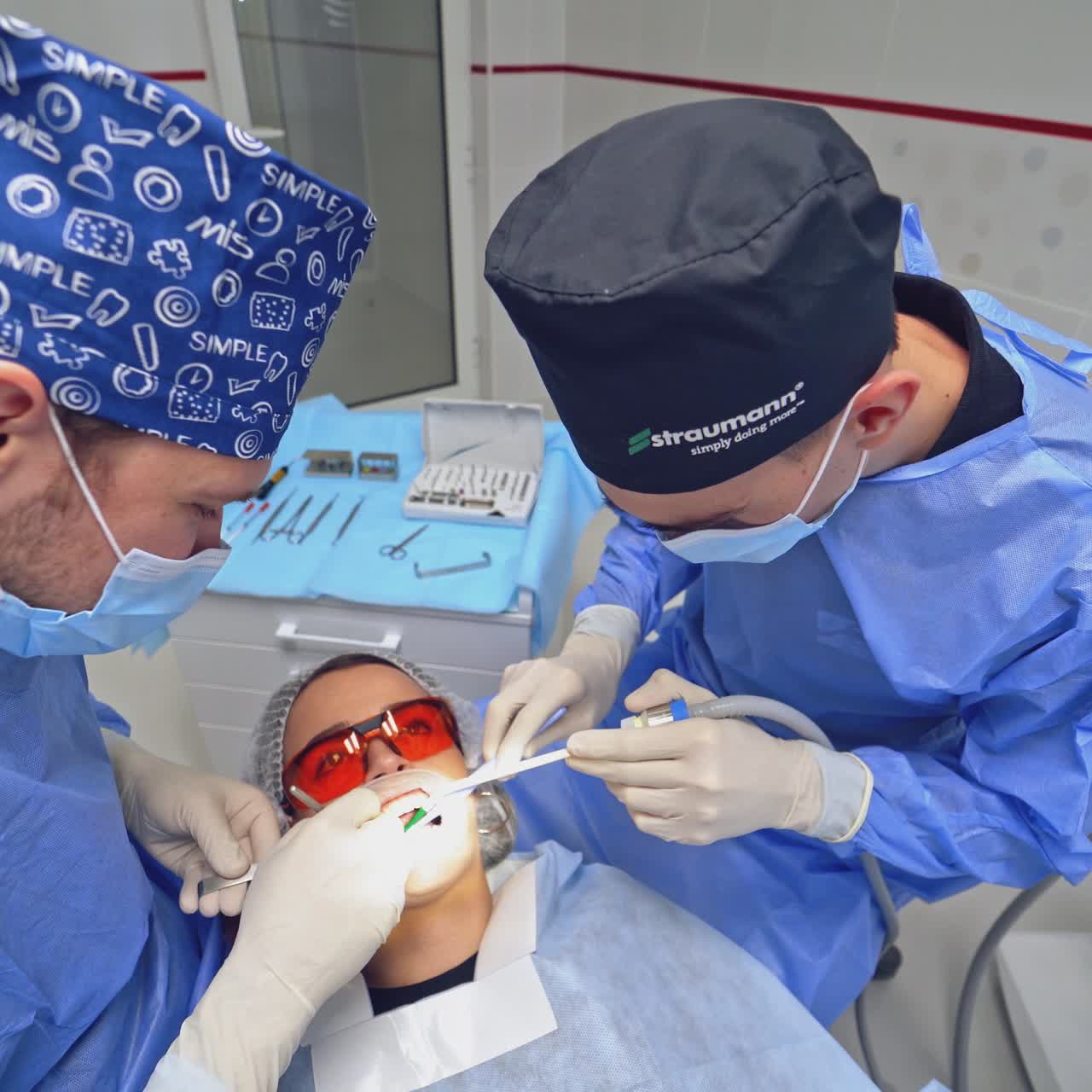 Dentist and assistant during teamwork