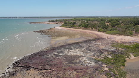 Aerial-drone-shot-of-Rocky-Beach-at-East-Point-Reserve-in-Darwin,-Northern-Territory