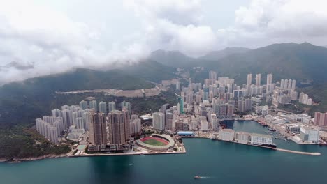 hong kong bay and waterfront residential skyscrapers, aerial view