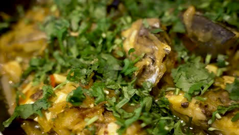 close up view of chopped cilantro on fish