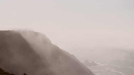 fog coming in from the atlantic ocean at the algarve, portugal