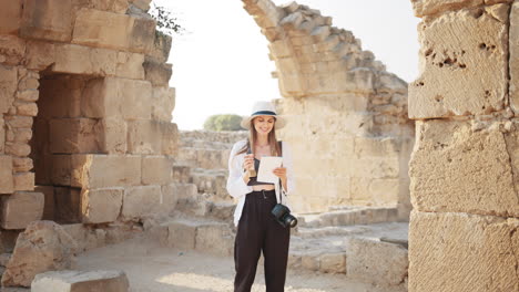 woman exploring ancient ruins