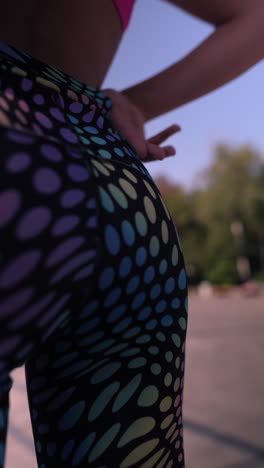 woman in colorful sport leggings