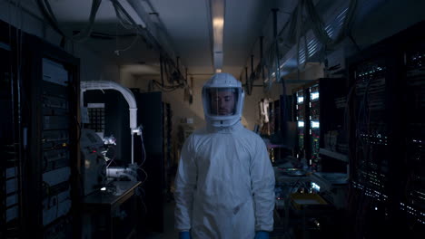 scientist in a hazmat suit in a server room