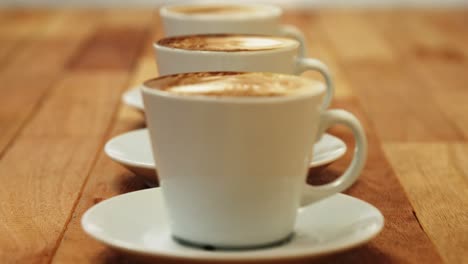 close-up of various coffee cup with saucer