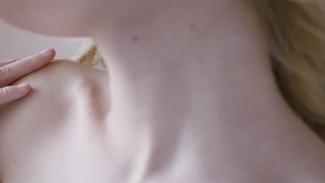 close-up of a woman's neck and shoulder