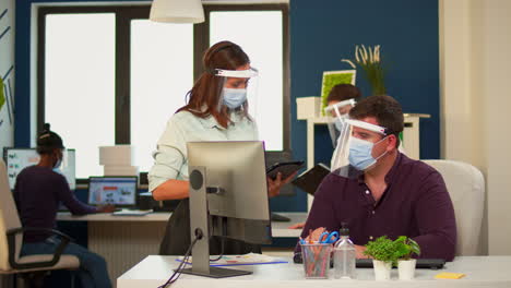 businesspeople crew with masks working at new startup project