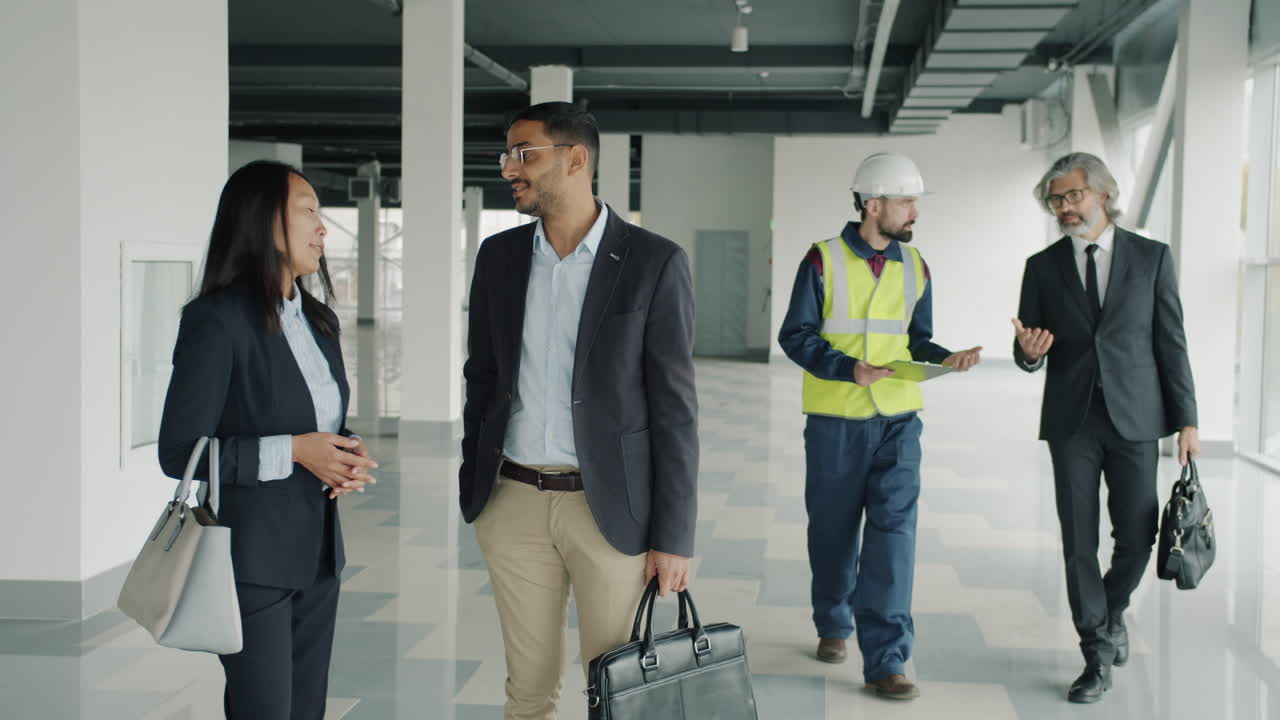 Business meeting at a construction site