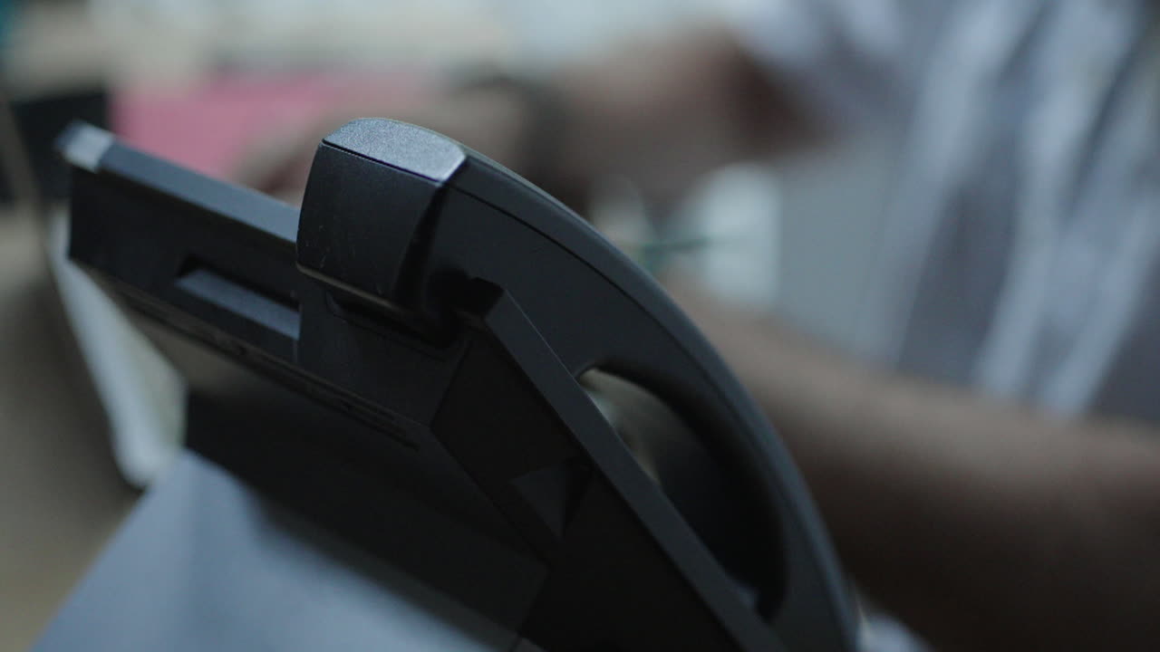 Close-up of a black office telephone