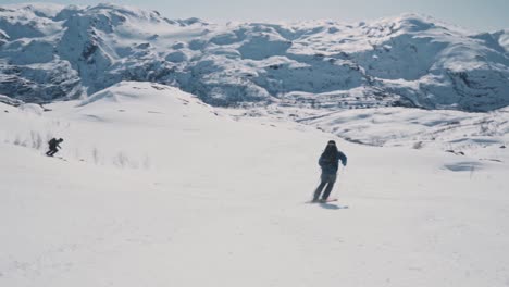 skier flies by at full speed down snowy slope in norway, vatnahalsen