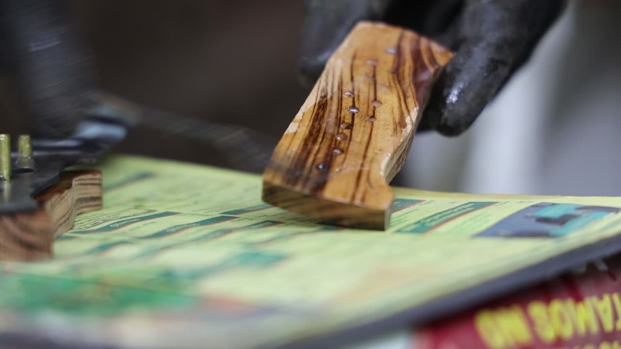 Passing glue on knife handle during process of knife fabrication