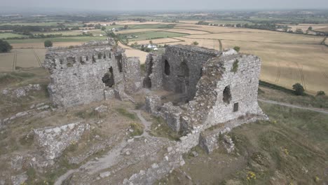 the rock of dunamase in county laois, ireland with surrounding farmlands - aerial drone shot